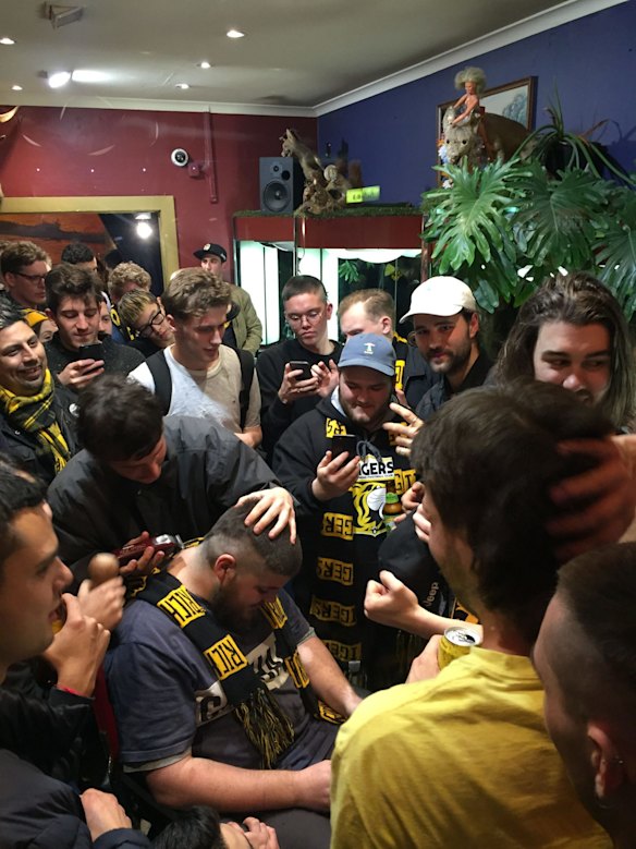 Tigers fans recieve Free Dustin Martin haircuts in swan street Richmond Picture Tom Cowie