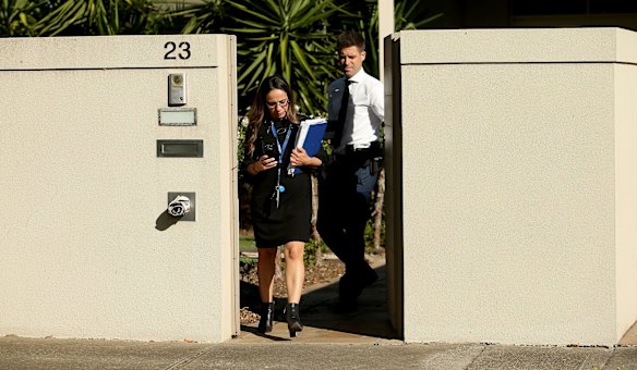 Police leave the home of missing woman Karen Ristevski in Avondale Heights on February 21, 2017 in Melbourne.