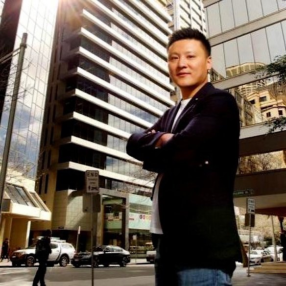 Troubled property tycoon Mingfeng “Richard” Gu.