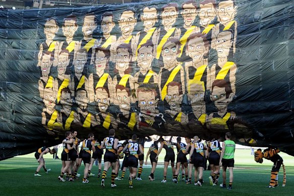 Richmond run through the banner.