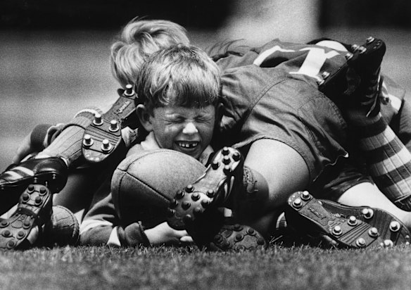 Stuart McKay from East Wallaroos junior Rugby Union side feels the weight of Australias World Cup victory. 16 February 1992.