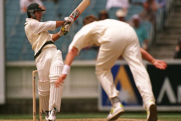 Ricky Ponting hits out against Shaun Pollock of South Africa during the Boxing Day Test at the MCG in 1997.