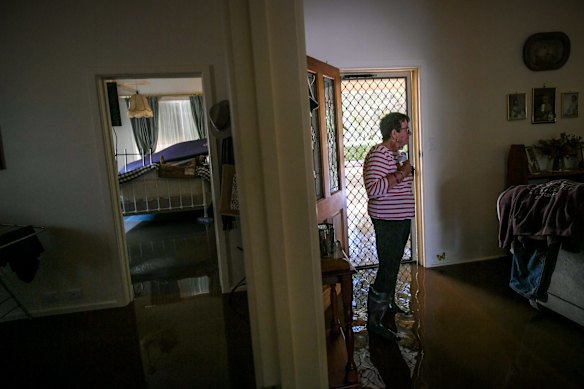 Glenys contemplates the clean-up.