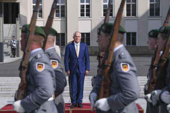 The PM inspects a military guard of honour.