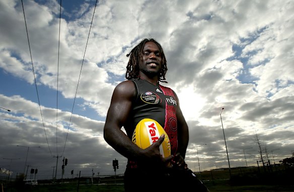 McDonald-Tipungwuti poses for a portrait at Essendon's training grounds.