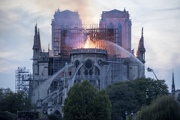A massive fire is ripping through the cathedral in central Paris, toppling the spire on the 850-year-old Gothic monument and leaving France in shock.