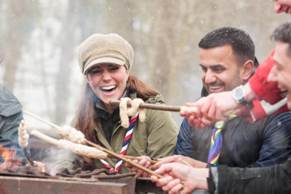 One can never fault the Duchess' modus operandi when it comes to her work attire. K.Middy lives by the "dress for the occasion" creed, as demonstrated here where she made bread twists with Cub Scouts in the snow back in March 2013 dressed like Oliver Twist.
