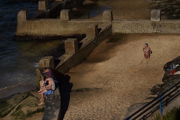 Locals at Coogee beach. More beaches in Sydney’s eastern suburbs open under a new ‘swim and go’ program.
