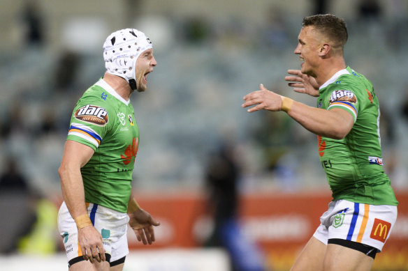 Man of the moment: Jarrod Croker, left, celebrates with Jack Wighton after  Wighton laid on his record-equalling try. 