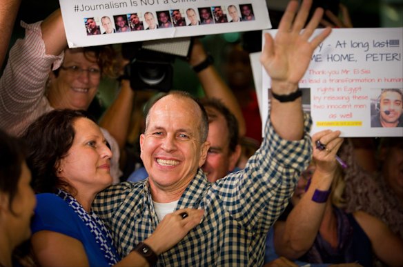 Greste is greeted by well-wishers.