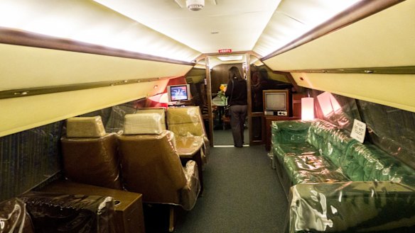 There are gold-plated belt buckles, suede seats, leather-topped tables - even the sinks in the two bathrooms are flecked with 24-karat gold.