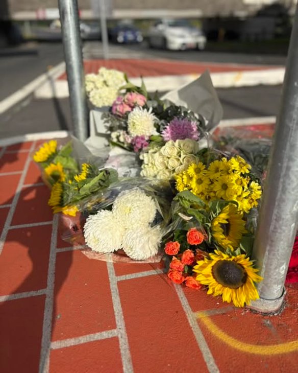 Flowers are left on the roundabout where Declan Phillips died, not far from the notorious bridge.