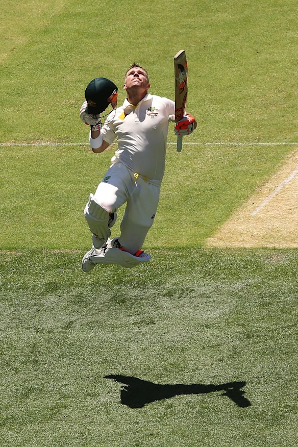 David Warner celebrates making his century.
