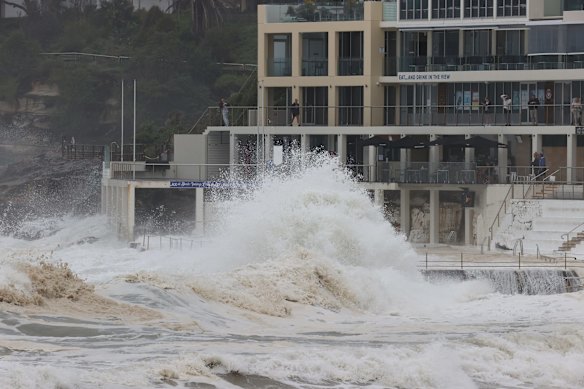 Icebergs is lashed by waves at Bondi.