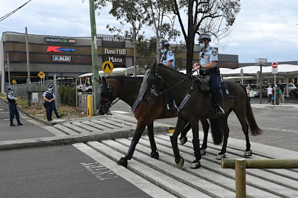 Heavy police presence at Bass Hill Plaza in anticipation of an anti-lockdown protest which never eventuated.
