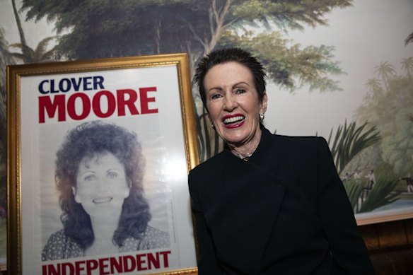 Clover Moore, standing next to an old campaign poster, claims victory as Sydney's Lord Mayor for the 5th time, Darlinghurst, Sydney.