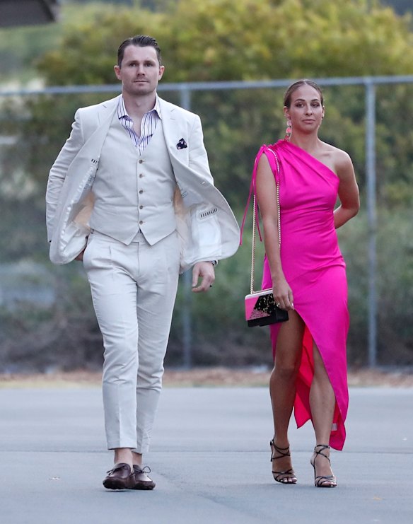 Patrick Dangerfield of the Cats and wife Mardi arrive at Metricon Stadium.