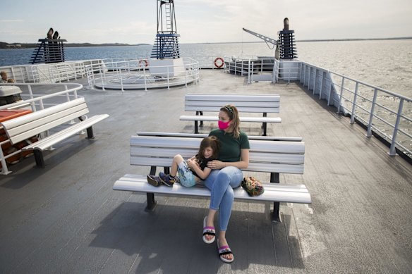 Lauren returning home to Seaford on the Queenscliff to Sorrento ferry after caring for her ill great-grandmother, with her children.