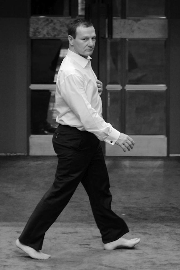 Graham Perrett leaves the House after voting on a procedure division during the asylum seeker Bill at Parliament House Canberra on 27 June 2012.