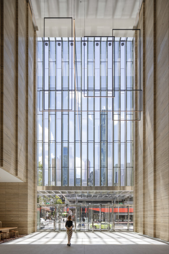 The foyer entry level of 405 Bourke Street – home to the National Australia Bank – features a cut glass, lantern-like entrance.