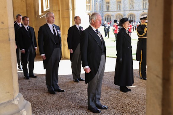 Vice-Admiral Sir Timothy Laurence, Peter Phillips, Prince Andrew, Duke of York, Prince Edward, Earl of Wessex, Prince Charles, Prince of Wales and Princess Anne, Princess Royal await to follow the coffin of Prince Philip to the chapel.