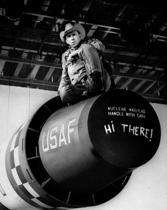 Actor Slim Pickens playing Major Kong sits atop a nuclear weapon in "Dr Strangelove"