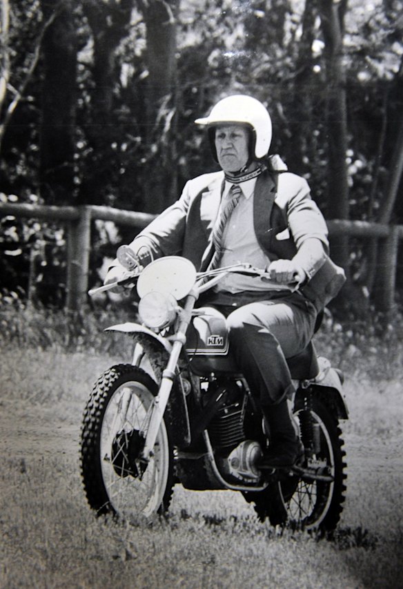 Former Prime Minister Malcolm Fraser rides his KTM 500 cc motor cycle. (12/12/77)