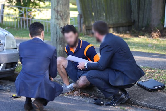 Mehmet Biber being arrested this morning in Birrong on terrorism and foreign incursion charges.