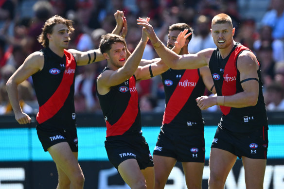 Bombs away: The Bombers, with Peter Wright a focal point, began the new season in style at the MCG.