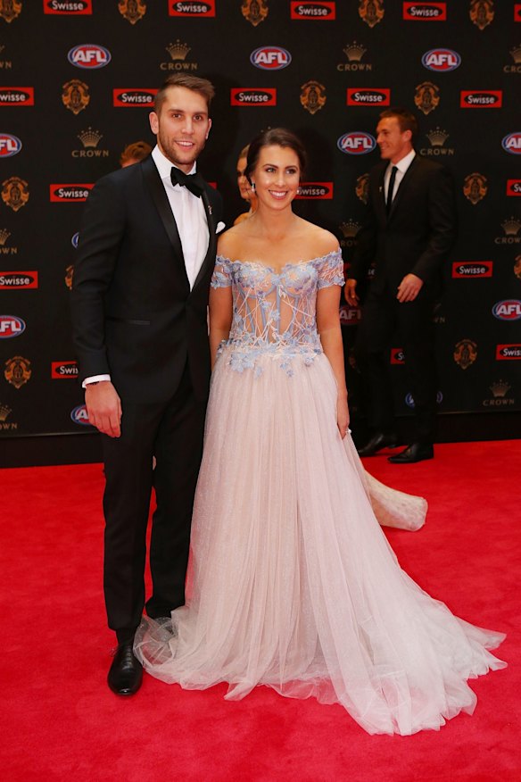 Jamie Macmillan of North Melbourne and Olivia Turnbull pose on the red carpet ahead of the 2016 AFL Brownlow Medal count at Crown Palladium on September 26, 2016 in Melbourne, Australia.