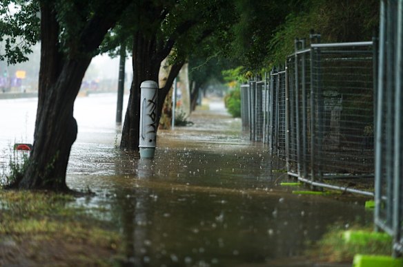 Northbourne Ave blocked off due to intense flooding. 