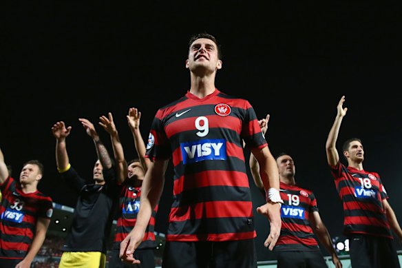 Tomi Juric of the Wanderers celebrates with his team in front of the crowd after victory during the Asian Champions League final match between the Western Sydney Wanderers and Al Hilal at Pirtek Stadium on October 25, 2014.