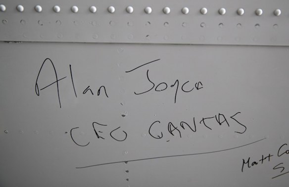 Qantas CEO Alan Joyce's signature on the underbelly of the last 747 before it departs for the final time.