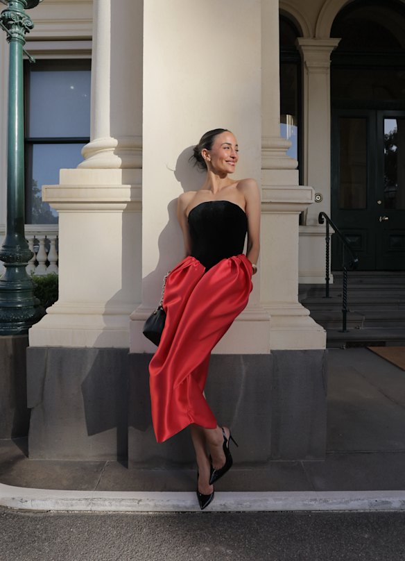 Abbey Gelmi wearing an Effie Kats dress and Christian Louboutin accessories. 