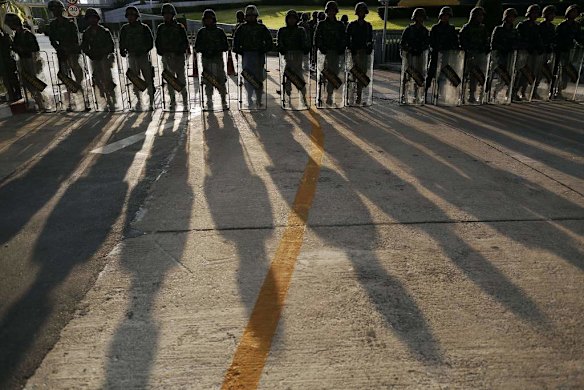 Soldiers block access to the Army Club.