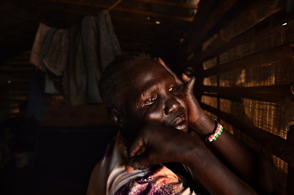 Nyajeba Chagor 55 from Malakal in her makeshift home inside the UN Juba Protection of Civilia's site on the outskirts of Juba. Nyajeba fled Malakal during the fighting during the civil war and is the survivor of a multiple rape attack also suffering a broken little finger on her left hand.