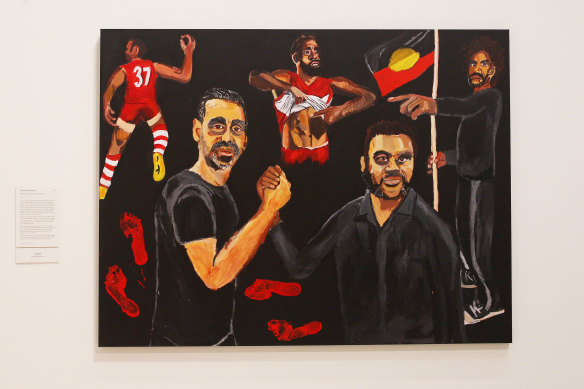 Artist Vincent Namatjira's 2020 Archibald Prize-winning portrait of himself and Adam Goodes.