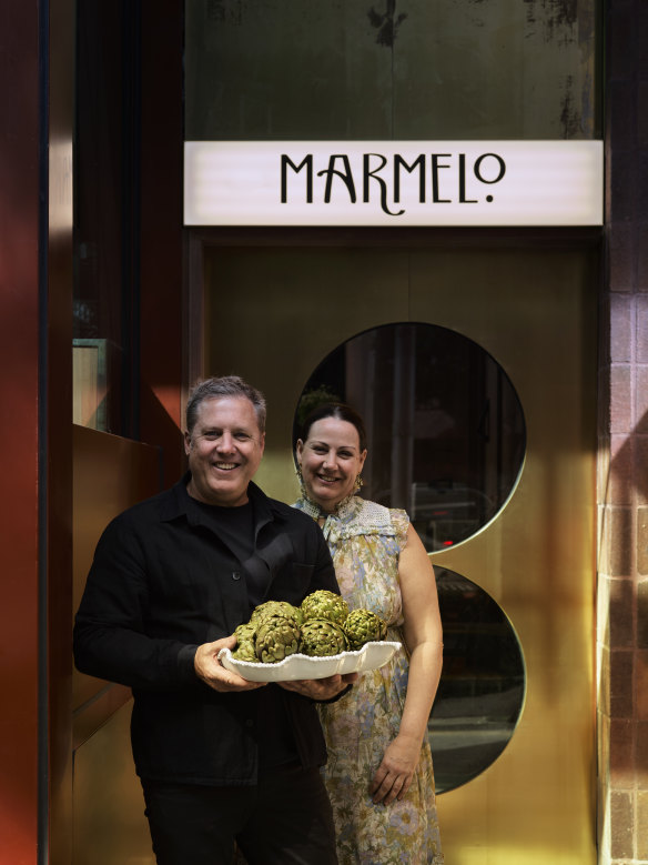 Ross and Sunny Lusted at the entrance to their new restaurant.