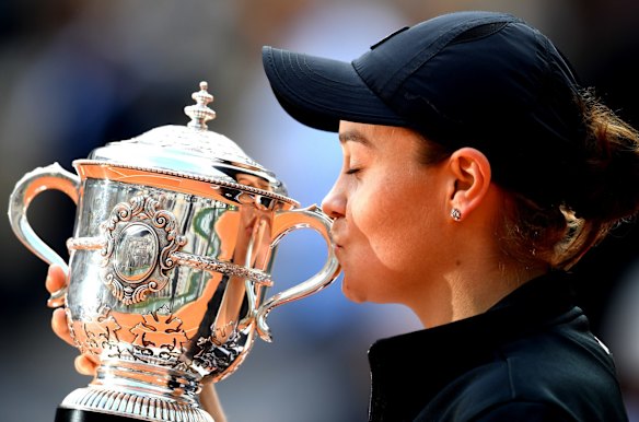 Kissing her first major trophy at the French Open in 2019. It would mark the start of her reign over the women's tennis rankings.