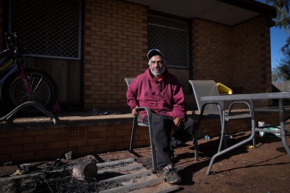 Mark Ebsworth outside his house in the former Gordon Estate in Dubbo, where riots were held in 2006. Dozens of homes were bulldozed the following year, homes sold off, and the estate was renamed Rosewood Grove.