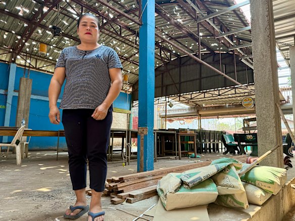 Tadam, underneath her roof, which was ruined in March in a freak hail storm. 