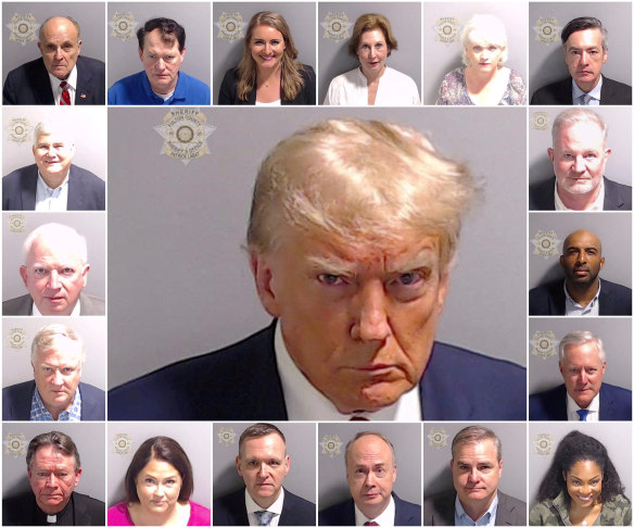 Police mugshots of former US president Donald Trump and the other 18 people charged with trying to overturn the election. Giuliani is top left.