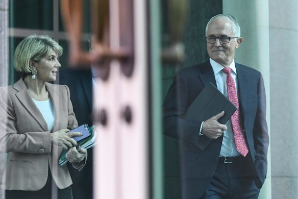Australian Prime Minister Malcolm Turnbull (right) and Australian Foreign Minister Julie Bishop arrive for a party room meeting at Parliament House in Canberra.