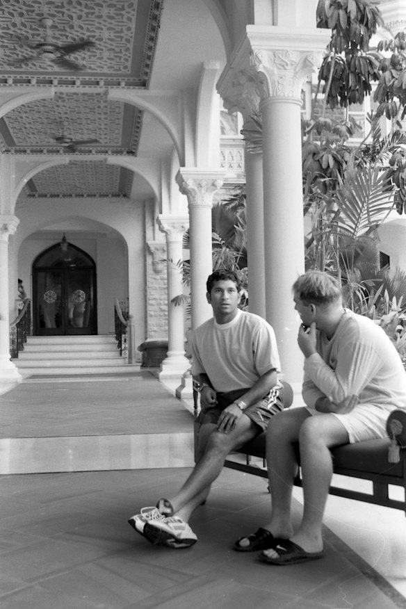 Warne chats with Indian batting great Sachin Tendulkar at the Taj Mahal Palace Hotel in Mumbai in February 2001.