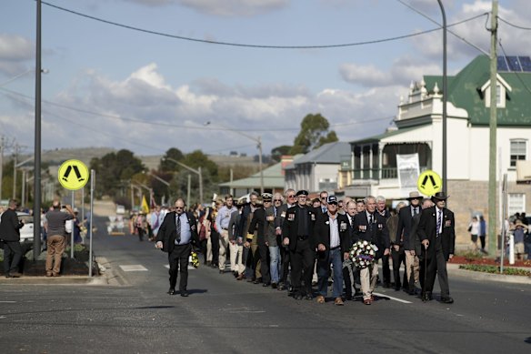 Veterans marching during Anzac day service in Braidwood, NSW.