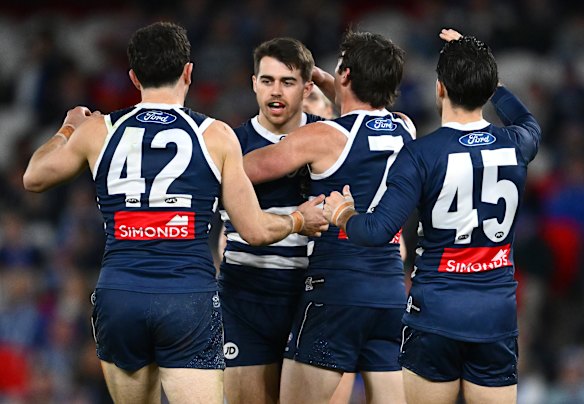 Get around him: Geelong had good reason to celebrate on Saturday.