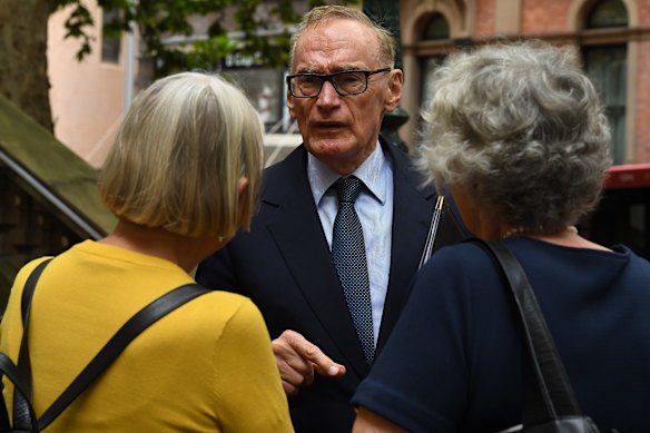 Former NSW Premier Bob Carr (centre) with Lee Rhiannon (left) leaving.