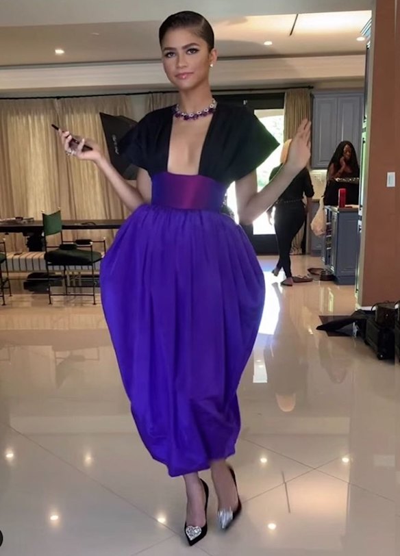 Zendaya wears Christopher John Rogers moire and silk taffeta with Bulgari jewels.