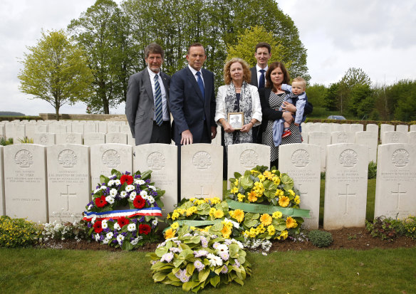Former prime minister Tony Abbott attended the headstone dedication ceremony for Corporal Athol Kirkland, along with the soldier's relatives in 2015.