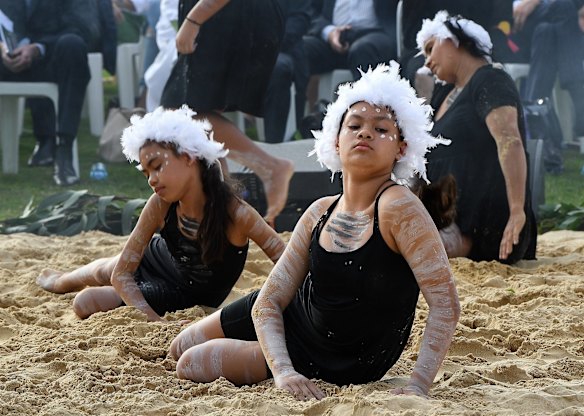 Koomurri-Bujja Bujja dancers during the smoking ceremony at the Wugulora morning ceremony at the Walumi Lawn in Barangaroo on Australia Day. Barangaroo, NSW. 26th January, 2022. Photo: Kate Geraghty 